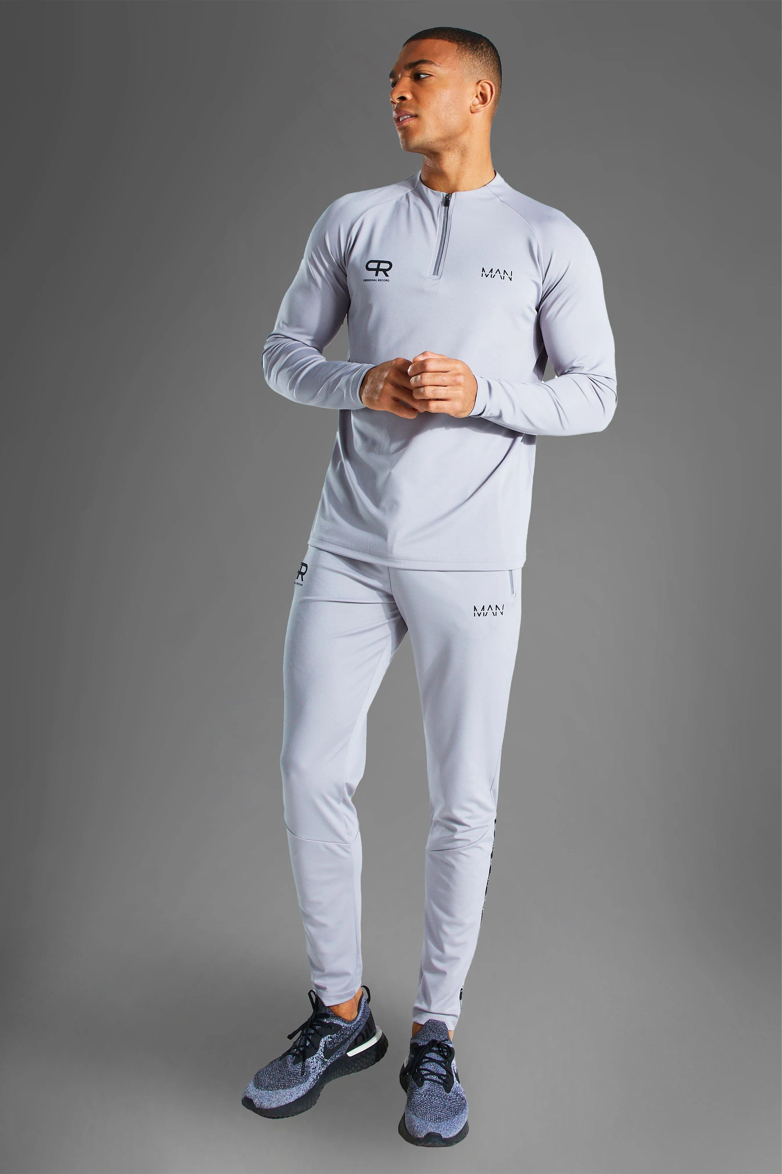 Man Active Logo 1/4 Zip Tracksuit | boohooMAN UK