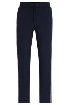 Regular-fit tracksuit bottoms with contrast piping 